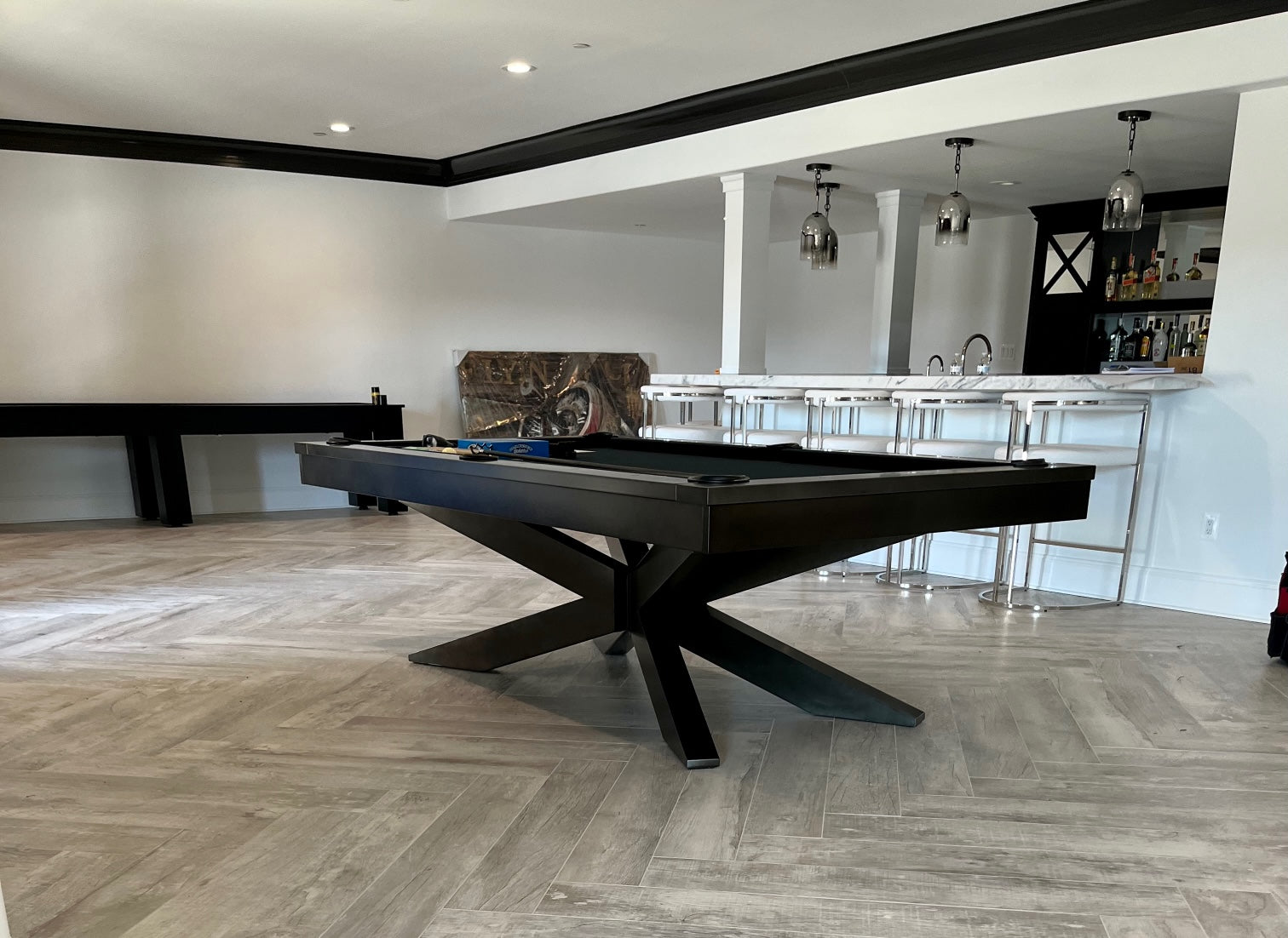 Plank and Hide Felix pool table and shuffleboard installed in Baltimore Maryland