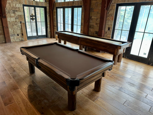olhausen pinehaven pool table with shuffleboard in cabin